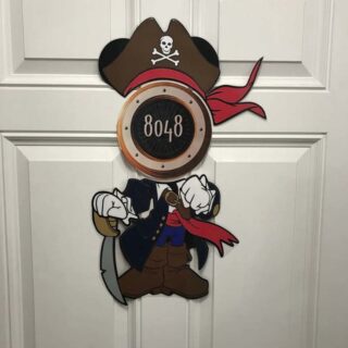 Full body Pirate Mickey decoration integrated into the stateroom number sign