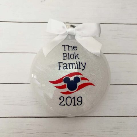 Round Christmas ornament with the Disney Cruise Line logo reading "The Blok Family, 2019"