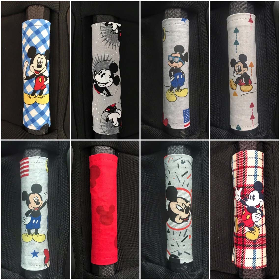 Eight cloth luggage handle wrappers, all featuring different Mickey Mouse designs